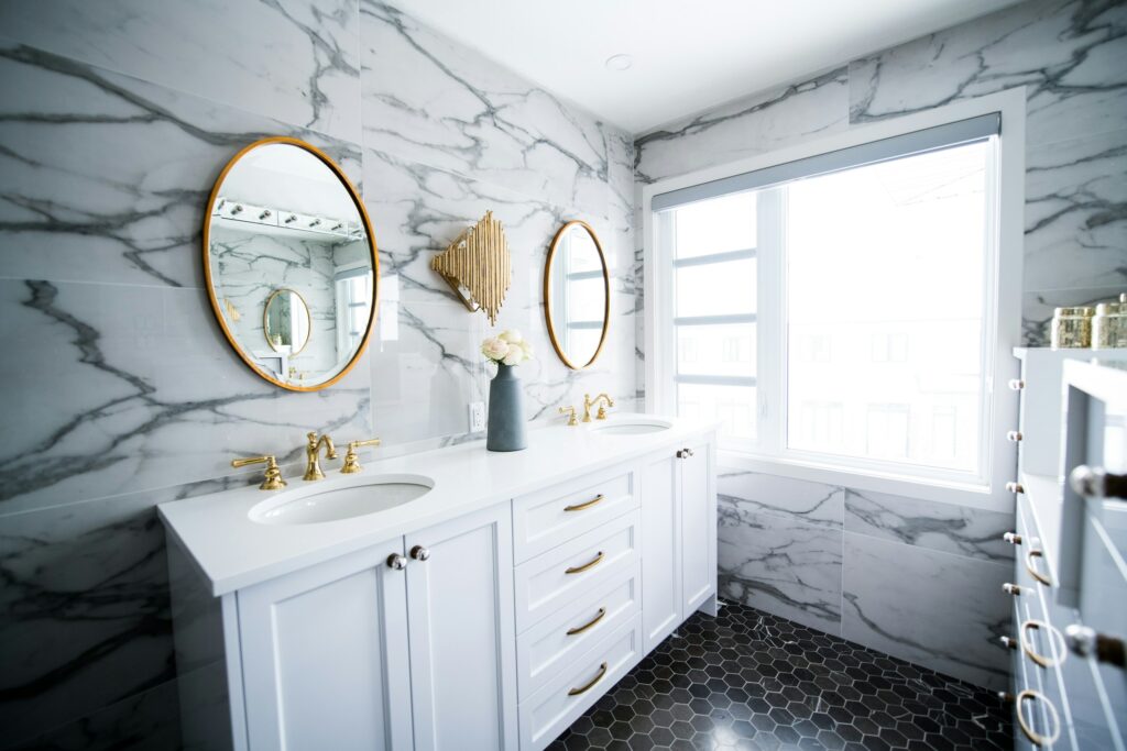 beautifully remodeled marble tile bathroom